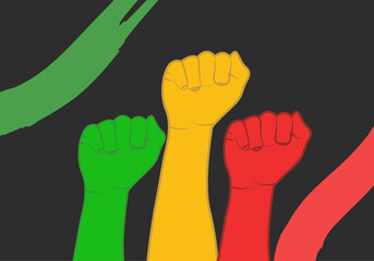 Puños de color rojo, amarillo y verde en fondo negro por la igualdad