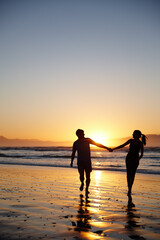 Couple, silhouette and holding hands at beach, sunset and care with bonding for love on valentines day. People, partnership and connection by waves, ocean or outdoor with mockup space in Australia
