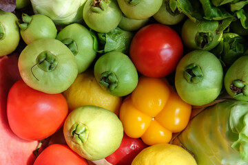 Variety of fresh vegetables in a wooden box. Selective focus.