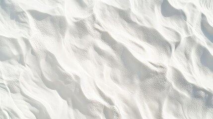 Fototapeta premium Pattern of gentle ocean waves against a white sandy beach