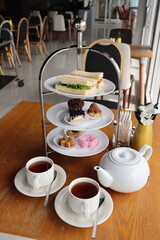 afternoon hitea tower with various delicious cake