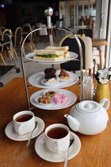 Fototapeta premium afternoon hitea tower with various delicious cake