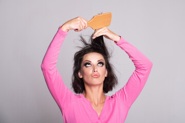 Messy hair. Brunette woman with messed hairs. Girl with bad frizzy hair. Sad woman having bad...