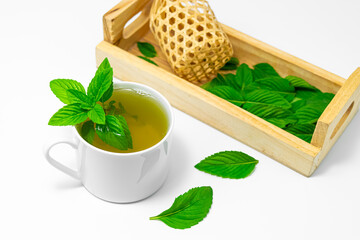 Peppermint tea in a white cup