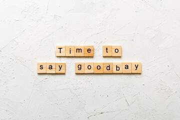 Time to say planning goodbay word written on wood block. Time for planning text on table, concept