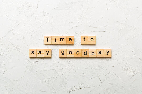Time to say planning goodbay word written on wood block. Time for planning text on table, concept