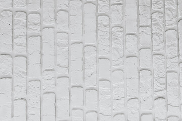 White textured wall with brick pattern in a modern environment