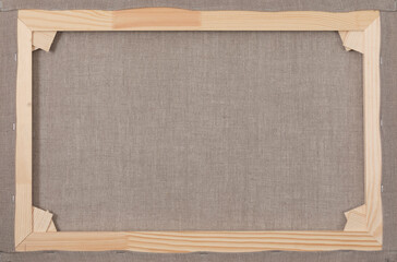 Reverse side of primed linen canvas.