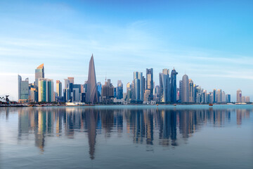 Naklejka premium Doha, Qatar - October 14, 2020: The Panoramic skyline of Doha, Qatar during sunrise
