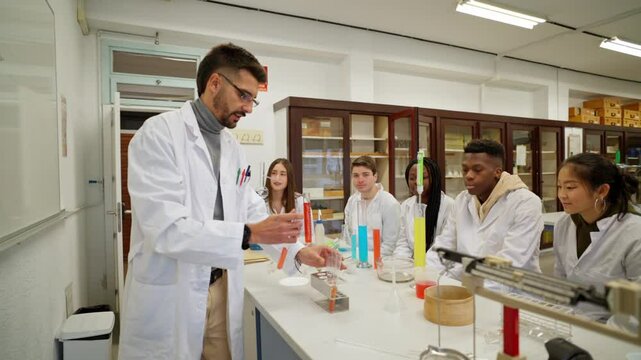 Chemistry teacher performing experiment for students