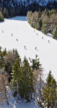 Aerial drone view of Col dei Baldi, Alleghe, in the Dolomites, Italy in daylight. Vertical