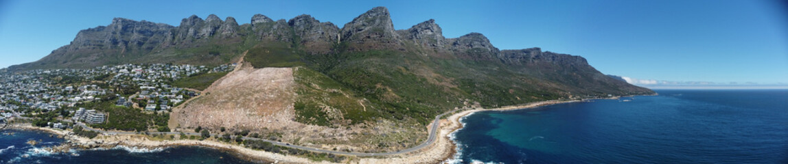 Twelve Apostles Mountain Range  South Africa Aerial Panorama with tarmac road in front of the mountains