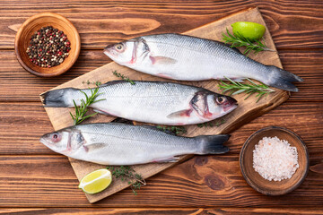 Raw sea bass fish photography . Top view