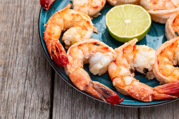 Grilled Tiger shrimps with lime photography . Top view