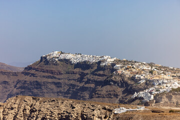 Magnificent view of the majestic volcanic cliffs of Santorini Island, Greece.