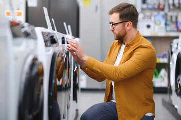 Male buying new washing machine