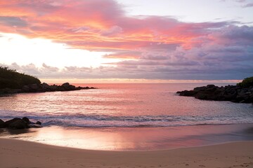 Fototapeta premium A breathtaking image of a tropical beach and sea at sunrise or sunset