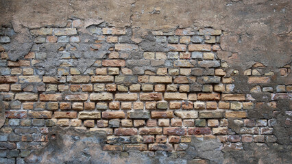 brick wall, in the photo the texture of the old brick wall and plaster