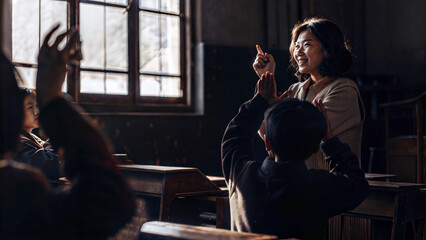 Teacher Black woman sign language communicate hearing-impaired student bright classroom interaction