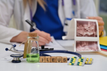 A skilled medical professional examines a patient for ileus signs using images, a stethoscope, and medications