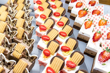 Savoyardi cakes with chocolate cream and chocolate decorations