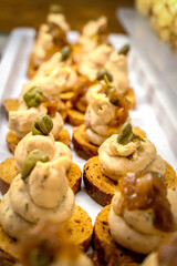 Bruschetta with seafood pasta and pistachios - Restaurant menu, table setting, festive buffet