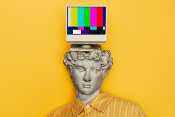 bust statue representing antiquity, with its head replaced by an old yellow TV, symbolizing the intersection of retro technology, media, and vintage aesthetics