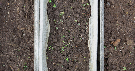 Organic Soil Texture in Concrete Cement Pot for Planting – Sustainability and Environmentalism Concept