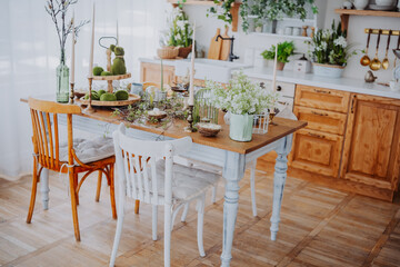 Cozy kitchen dining area with natural decor and fresh greenery
