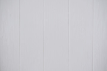 White wooden wall with subtle texture adds depth to any interior decor