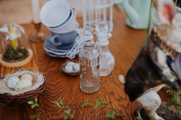 Decorative spring table setting with vintage items and natural elements