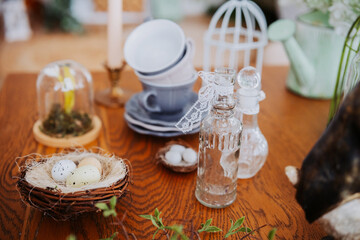 Beautiful spring table setting with decorative items and natural elements