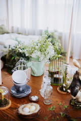 Spring decoration with flowers and vintage items in a bright room
