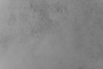 Textured gray background with subtle variations in tone and pattern