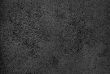 Concrete surface with textured finish in dim lighting for artistic purposes