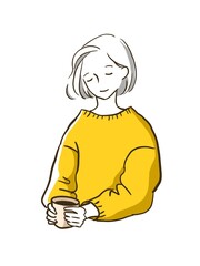 コーヒーカップを持ってくつろぐ女性