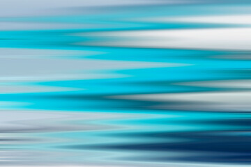 Blue abstract motion blurred background. Light pale blue surface 