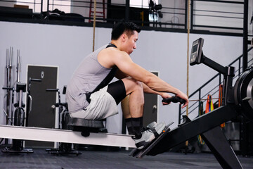 Fototapeta premium Asian men exercising in the gym, health exercise concept.