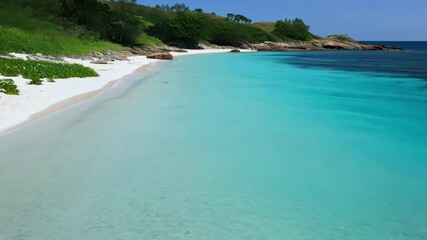 Stunning beach with clear water and soft sand under the sun