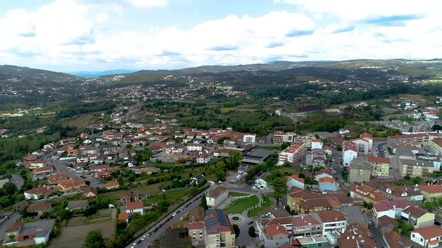 Drone footage that captures a big part of the city of Fafe, Portugal. It shows lots of houses and mountains down the line.