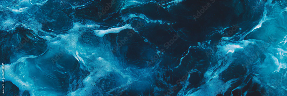 Poster indigo blue water with intense ripples and gentle waves creating a serene backdrop