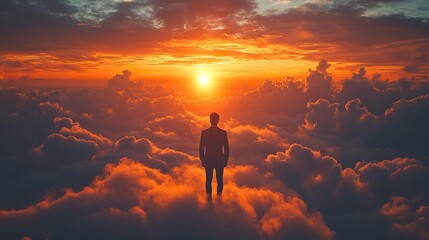 Obraz premium facing my faith businessman standing in the middle of the clouds and looking at the sunset