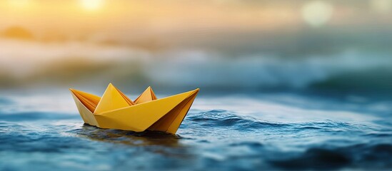 Golden paper boat navigating calm ocean waters at sunset, symbolizing leadership and guidance, with vibrant orange and blue hues in background.