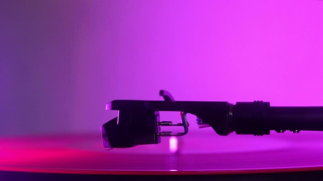 Vinyl Record Player Stylus Close-up Video Needle Dropping on Vinyl Blurred Background Copy Space Idea Music Playing .12&rdquo; 33 RPM
