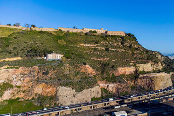 Montjuic lighthouse in the Montjuic hill in Barcelona, Catalonia. Old lighthouse overlooking the...