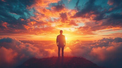 Fototapeta premium facing my faith silhouette of a man looking at the sky at sunset