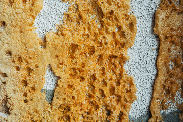 Textured wall with natural patterns and earthy tones in close-up view