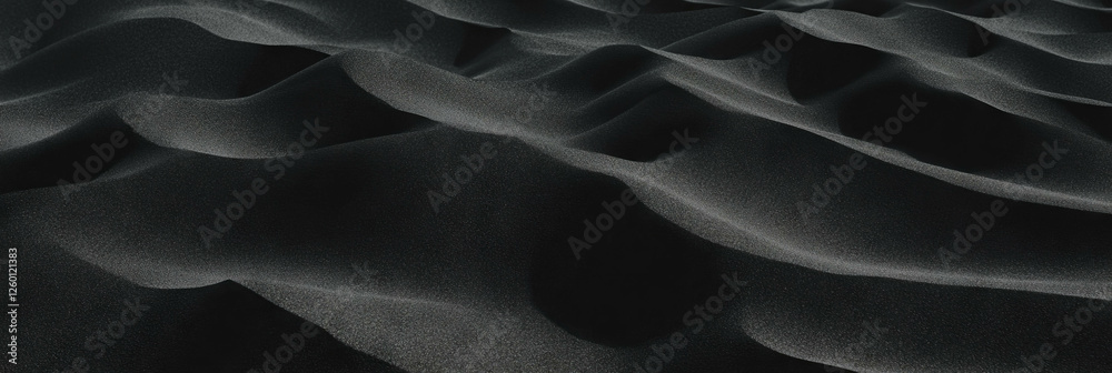 Poster coarse black volcanic sand texture highlighting angular grains and sharp shadows