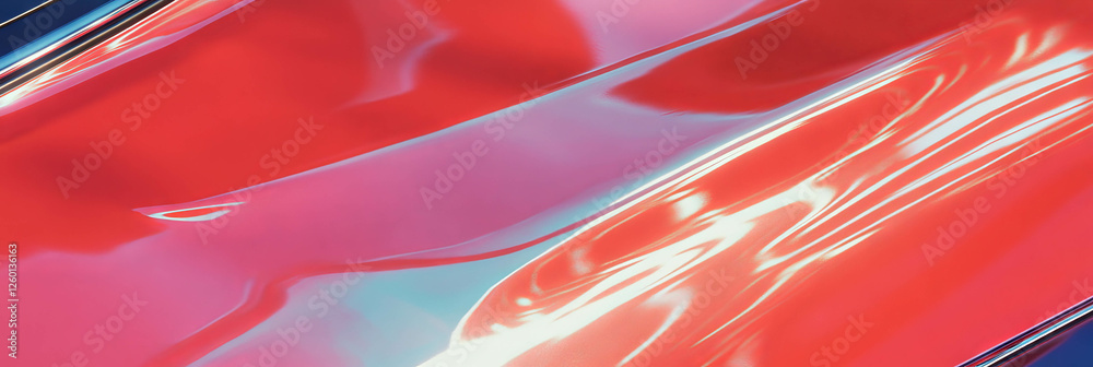 Poster glossy plastic surface with chrome trim reflecting vibrant colors and sharp angles