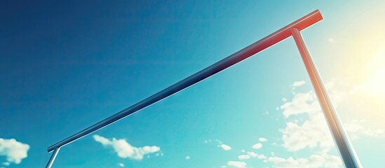 High jump bar against a bright blue sky with fluffy clouds, positioned centrally, capturing sunlight for a dynamic sports atmosphere.